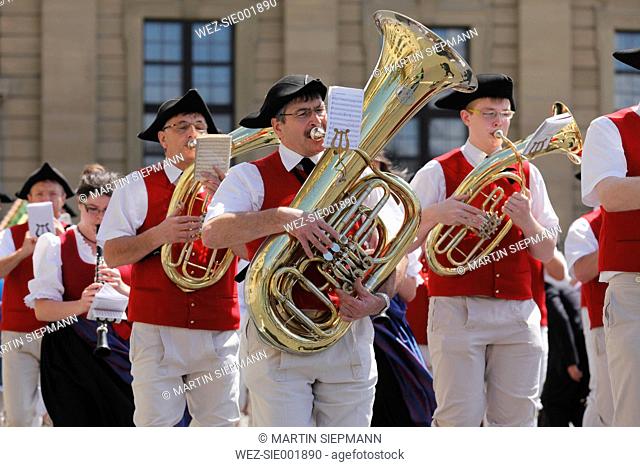 Germany, Bavaria, Wuerzburg, Parade in traditional costume at kiliani festival