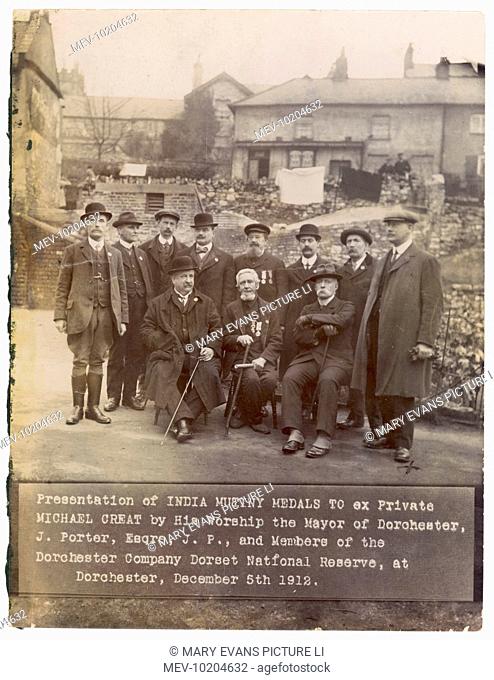 Former private Michael Creat (centre) receives medals from the Mayor of Dorchester to commemorate his role in the Indian Mutiny of 1857