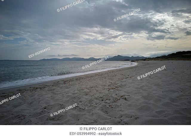 View of Piscina Rei Beach in the south of Sardinia completely free from tourists during sunset