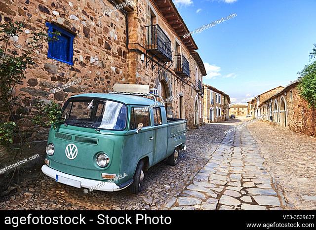 Classic old van in medieval streets of Castrillo de los Polvazares (Leon province, region of Castilla y Leon, Spain)