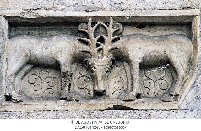 One of the symbols of the Four Evangelists (ca 1099), marble bas-relief of Wiligelmo (11th-12th century), facade, Modena Cathedral (UNESCO World Heritage List