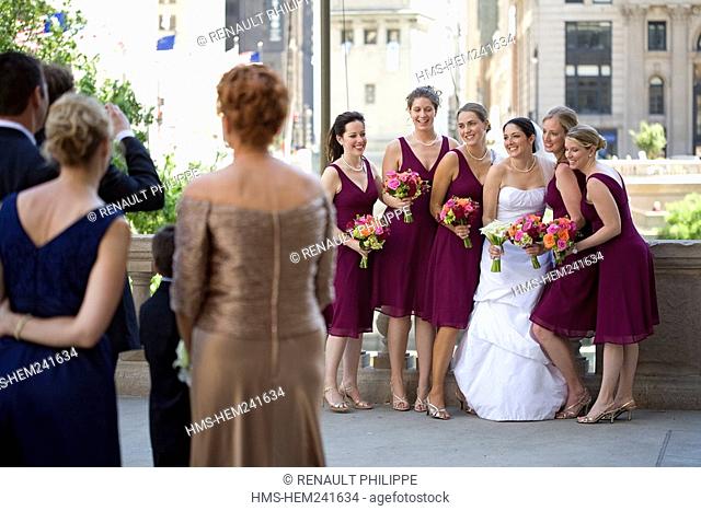 United States, Illinois, Chicago, Magnificent Mile District, bride and her bridesmaids