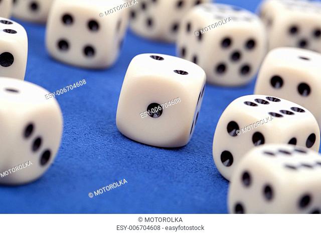 gambling dices on blue background