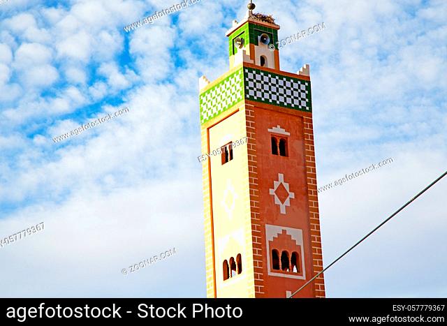 mosque muslim   the history symbol in morocco africa minaret  religion and blue  sky