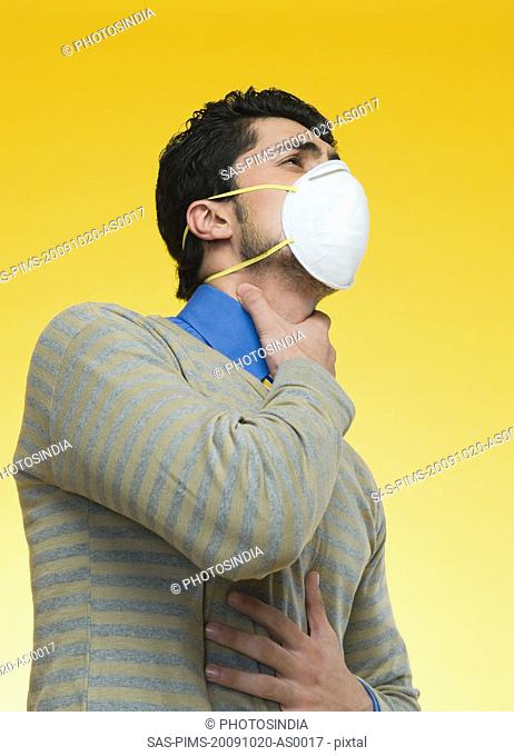 Man wearing a pollution mask