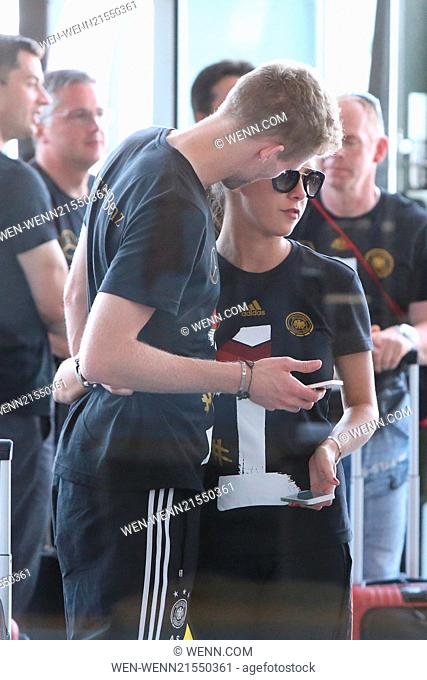 Members of the German National Football Team checking in at Tegel airport to fly to their home towns. Featuring: Andre Schuerrle, Montana Yorke Where: Berlin