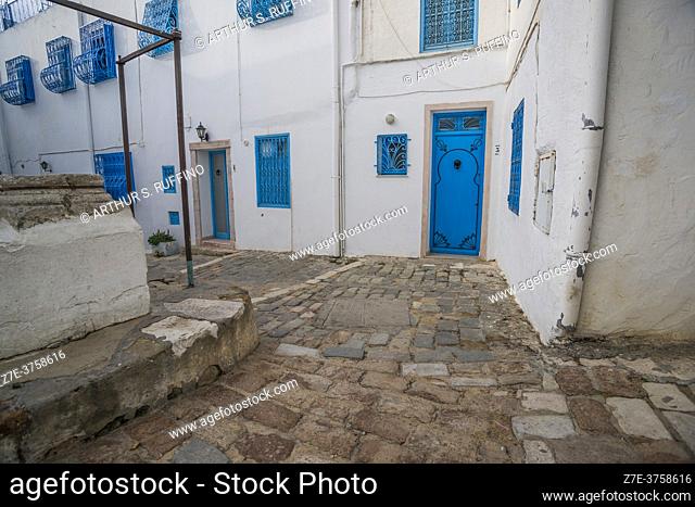The cobbled streets of Sidi Bou Said. The blue and white tourist attraction overlooking the Mediterranean Sea. Tunisia, Africa
