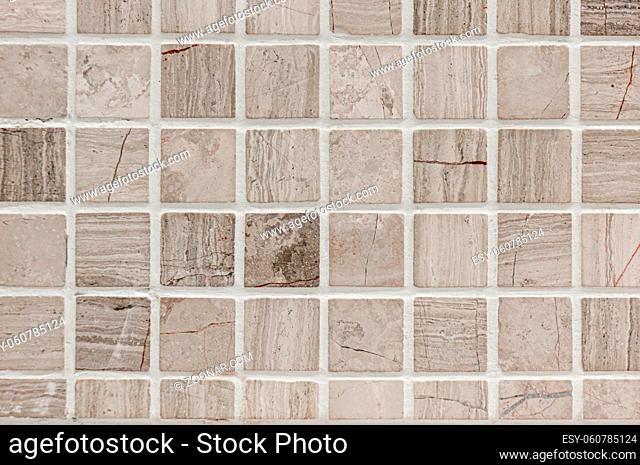 White or gray ceramic wall and floor tiles abstract background. Design geometric mosaic texture for the decoration
