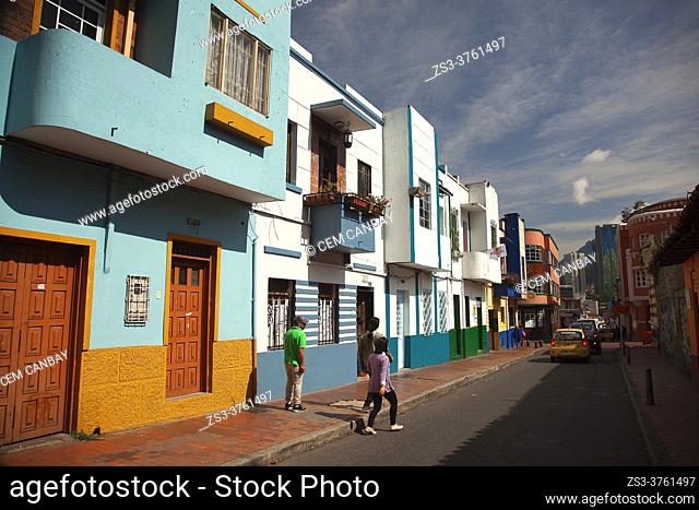 Local people walking in front of the colonial buildings at the historic center, Bogota, Cundinamarca, Colombia, South America