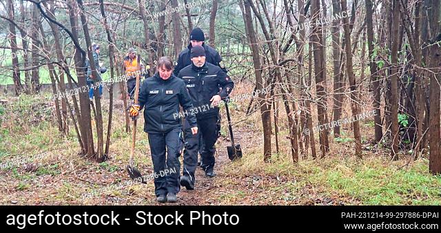 14 December 2023, Saxony-Anhalt, Stendal: Police officers search for clues in the case of five-year-old Inga on a former military site a few kilometers west of...