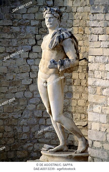Porch with a statue of Emperor Hadrian (76-138), Puymin district, Vaison-la-Romaine, Provence-Alpes-Cote d'Azur, France