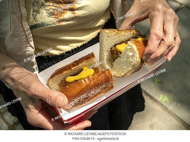 A foodie with her lunch of Beyond Meat brand Beyond Sausage at a promotional event in New York on Thursday, May 24, 2019