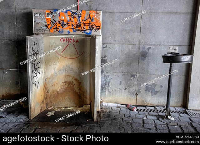 Illustration picture shows a public men's urinal (urinoir-toilet-restroom) tagged with graffiti during a police action related to crime and anti-social...