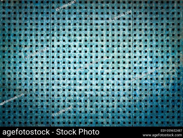 Bluish metallic background with perforation of square holes