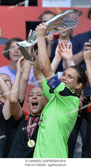 Nadine Angerer of Germany celebrates after winning the UEFA Women's EURO 2013 final soccer match between Germany and Norway at the Friends Arena in Solna