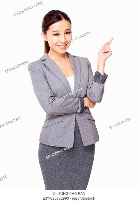 Young businesswoman finger point up