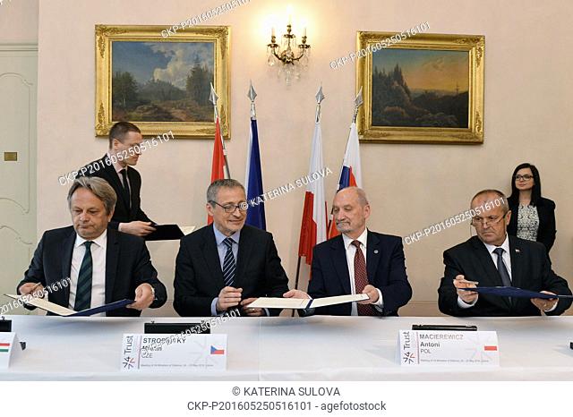 From left to right, Hungarian Defense Minister Tomas Vargha, Czech Defense Minister Martin Stropnicky, Polish Defense Minister Antoni Macierewicz and Slovak...