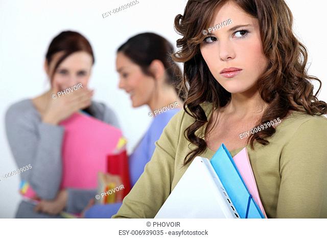 girl being mocked by fellow students