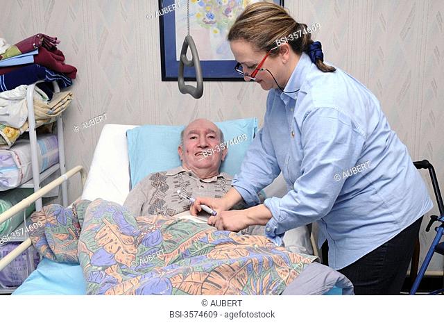 Independent nurse, in Vénissieux, France. Patient care presenting an alteration of mobility motor handicap following a cerebral vascular accident