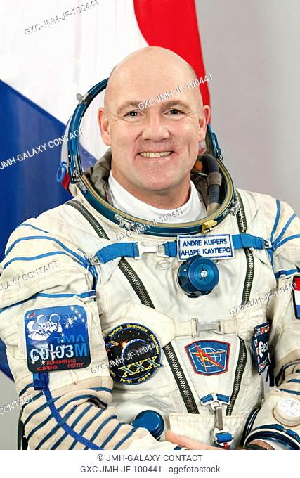 European Space Agency astronaut Andre Kuipers, Expedition 3031 flight engineer, attired in a Russian Sokol launch and entry suit