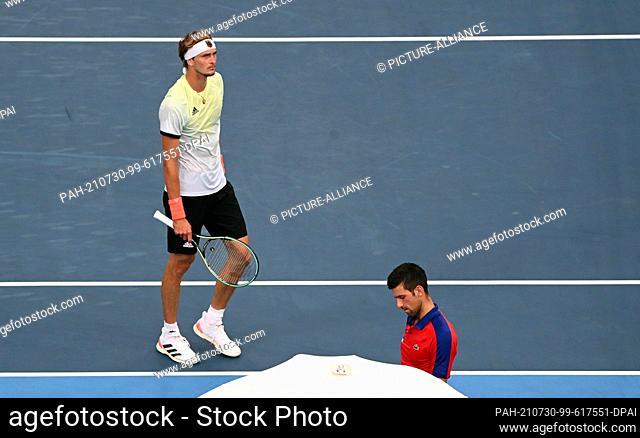 30 July 2021, Japan, Tokio: Tennis: Olympics, Preliminary, Singles, Men, Semifinals Djokovic (Serbia) - Zverev (Germany) at Ariake Tennis Centre