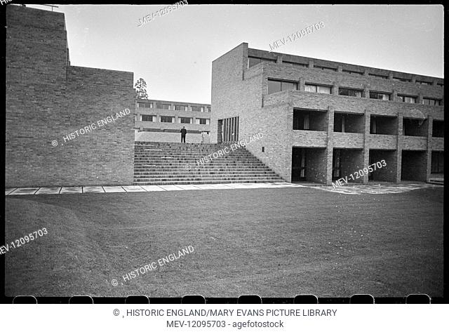 Exterior view of Harvey Court, student residences built between 1960-62 surrounding a square raised courtyard, seen from the south and looking up the stairs in...