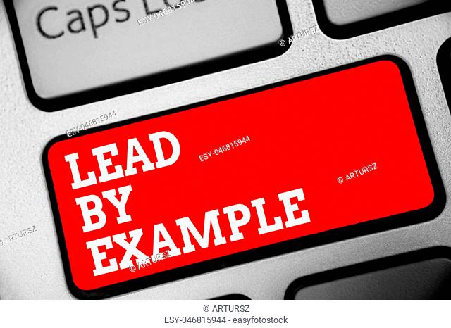 Word writing text Lead By Example. Business concept for Be a mentor leader follow the rules give examples Coach Keyboard red key Intention create computer...