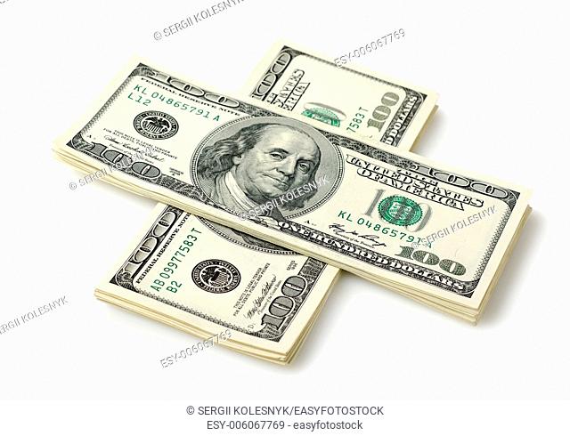 Money in the form of a cross isolated on white