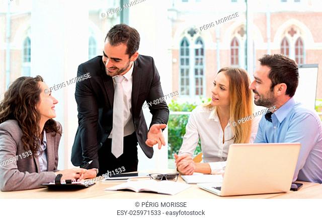 View of a Group of business people working together at the office