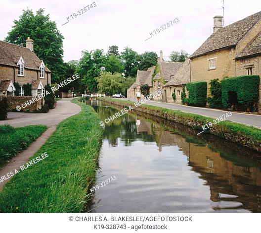 Slaughter brook flowing through Cotswolds' village of Lower Slaughter. Gloucestershire, England, UK