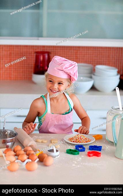 Nice daughter baking at home