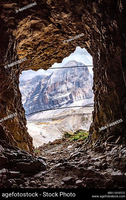 View out of a loophole of the Mount Lagazuoi tunnels, built during the First World War, the Dolomite Alps in South Tirol