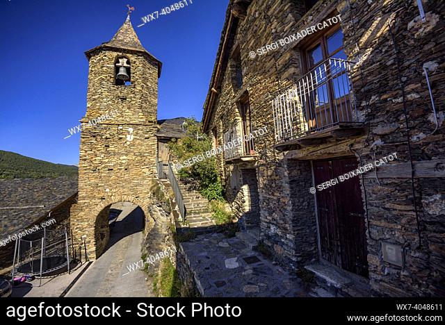 Bell tower of the church of Sant Roc, in Farrera, in the Coma de Burg valley, on a summer morning (Pallars SobirÃ , Lleida, Catalonia, Spain, Pyrenees)