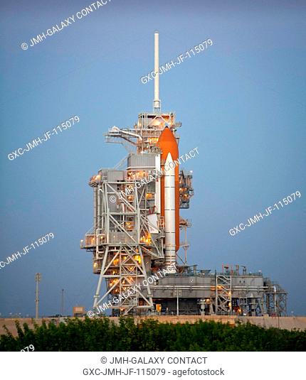 The space shuttle Discovery is seen on launch pad 39a early in the morning of Sunday, Oct. 32, 2010 at the NASA Kennedy Space Center in Cape Canaveral, Fla
