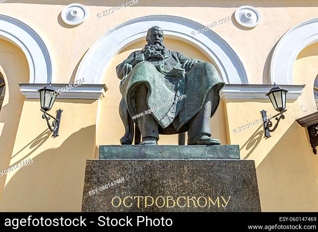 Moscow, Russia - April 10, 2021: Bronze monument to russian writer and playwright Ostrovsky near the Maly Theatre on Teatralnaya Square