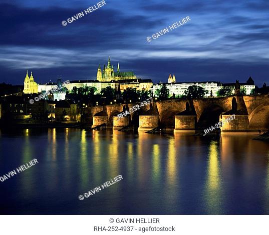 The Vltava River and Charles Bridge with St. Vitus Cathedral and St. Nicholas Church on the skyline of the city of Prague, Czech Republic, Europe