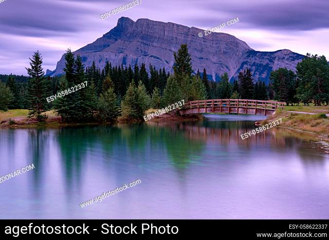 Panoramic image of early morning mood on Cascade Ponds with Mount Rundle in the background, Banff National Park, Alberta, Canada