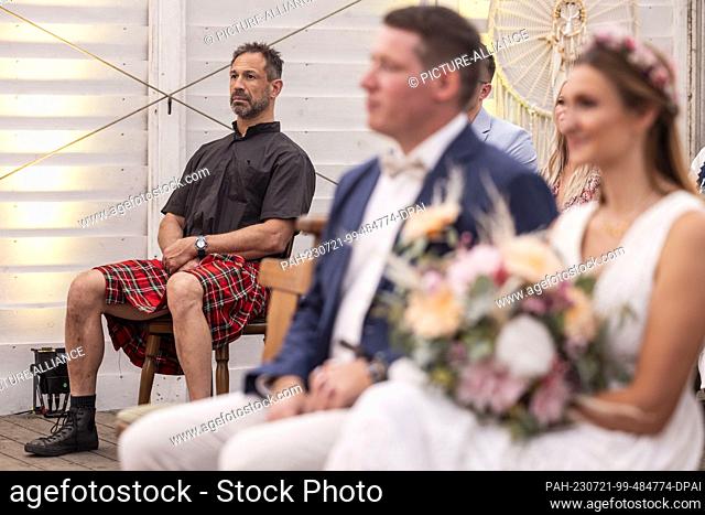 21 July 2023, North Rhine-Westphalia, Weeze: Alina and Ivo from Heinsberg celebrate their civil wedding at the festival in Weeze