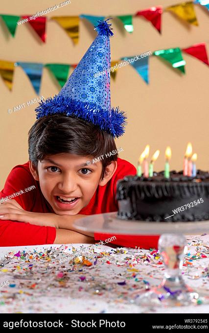 Portrait of happy boy celebrating his birthday