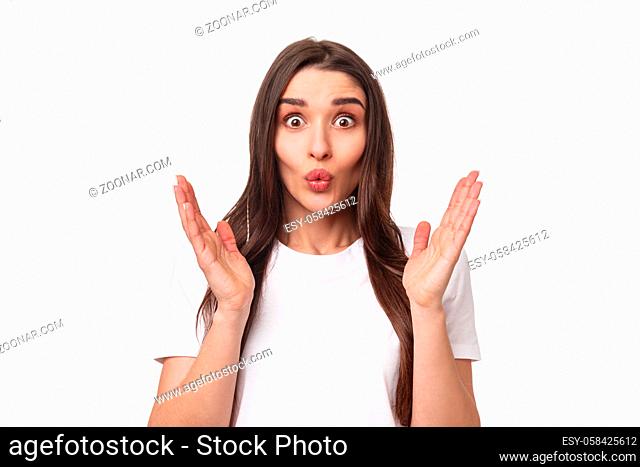 Portrait of happy surprised young woman glad hear friend getting promoted, clasp hands in congratulations, folding lips astonished and excited