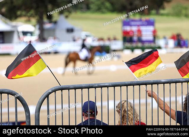 16 September 2022, Italy, Rocca Di Papa: Equestrian sport: world championship, eventing, dressage. Fans of the eventing rider Dibowski (Germany) wave their...