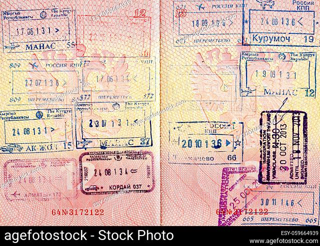 Travel background from Russian passport pages with visa stamps