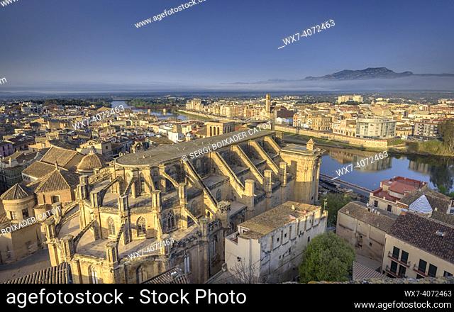Sunrise in the city of Tortosa, seen from the viewpoint of the Suda castle, currently a hotel (Tortosa, Catalonia, Spain)