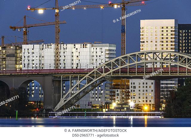 STOCKHOLM, SWEDEN Modern neighborhood of Liljeholmskajen and the Šrsta train bridge