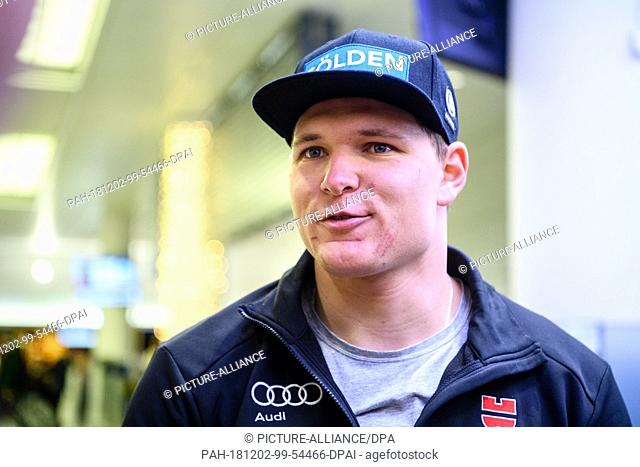 02 December 2018, Bavaria, München: Ski racer Thomas Dreßen makes a press statement on his arrival at the airport after his heavy fall on the descent to Beaver...