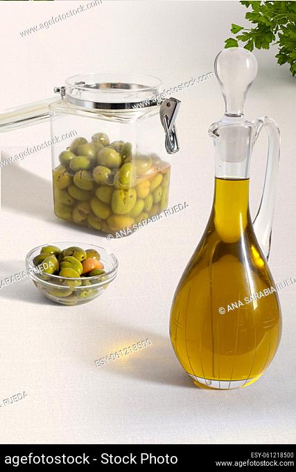 Pure olive oil and natural olives ready to consume