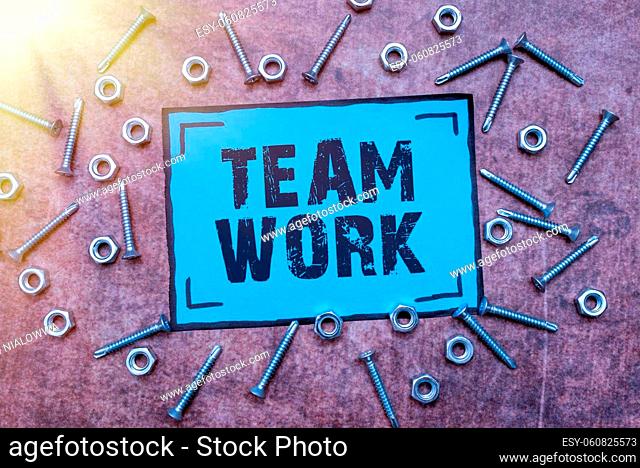 Conceptual caption Team Work, Business showcase Combined action of a group Workgroup cooperation collaboration New Ideas Brainstoming For Maintenance Planning...