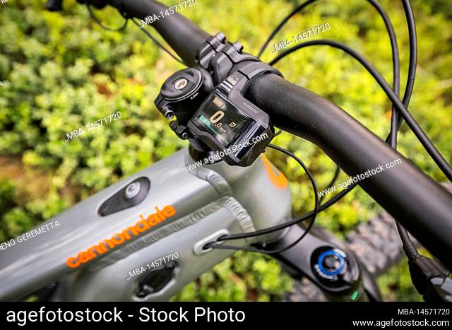 Italy, Dolomites, detail of a modern e-bike / e-mtb in the forest, green mobility