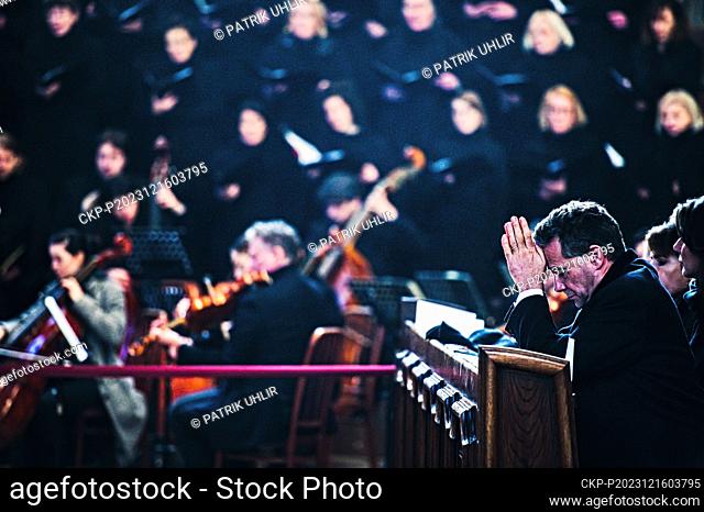 Son of Karel Schwarzenberg Jan, right, is praying during the Requiem mass led by Archbishop of Vienna and Cardinal Christoph Schonborn in commemoration of late...