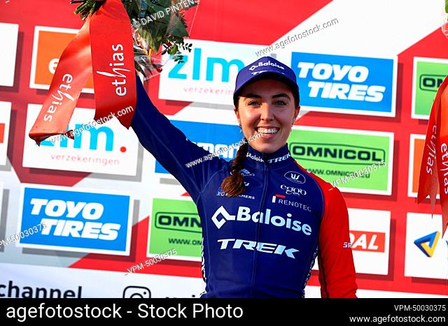 Dutch Shirin van Anrooij celebrates on the podium after winning the women elite race at the UCI Cyclocross World Cup cyclocross event in Beekse Bergen
